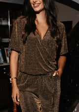 KATTY SS JUMPSUIT - BLACK W. GOLD